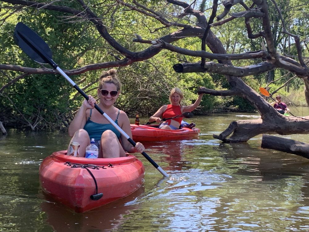 Guests enjoy a kayak trip on the Galien river.