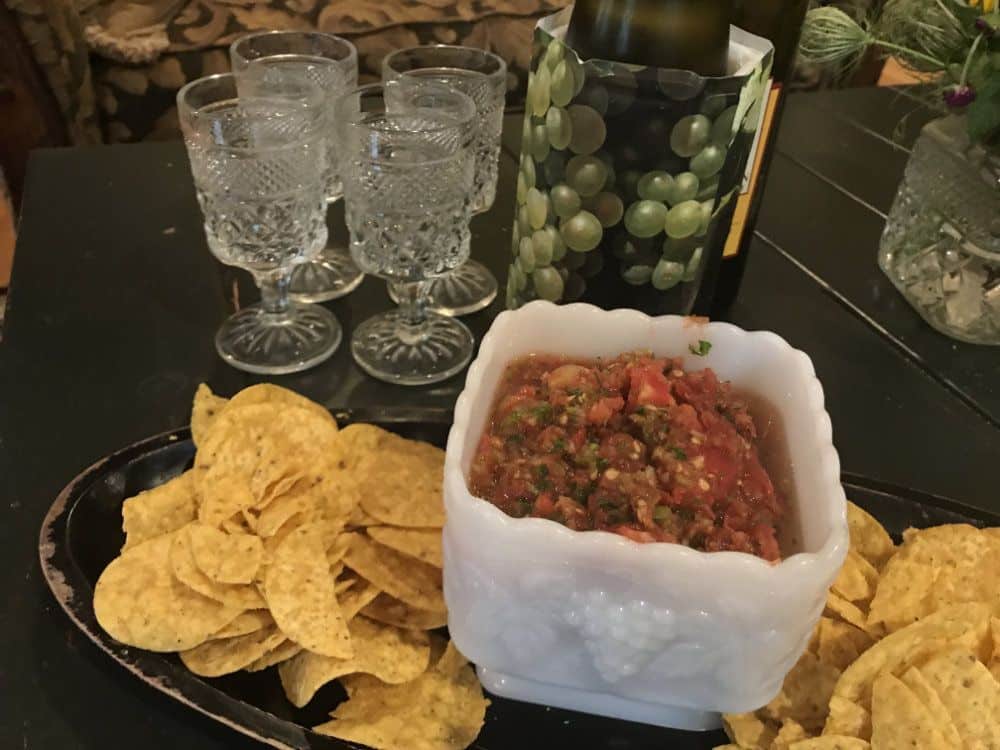 Chips and homemade salsa served with local wine.