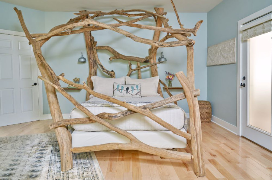 The amazing Driftwood bed with large twisting driftwood branches all around.