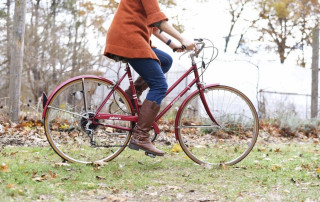 Woman on a bicycle in fall